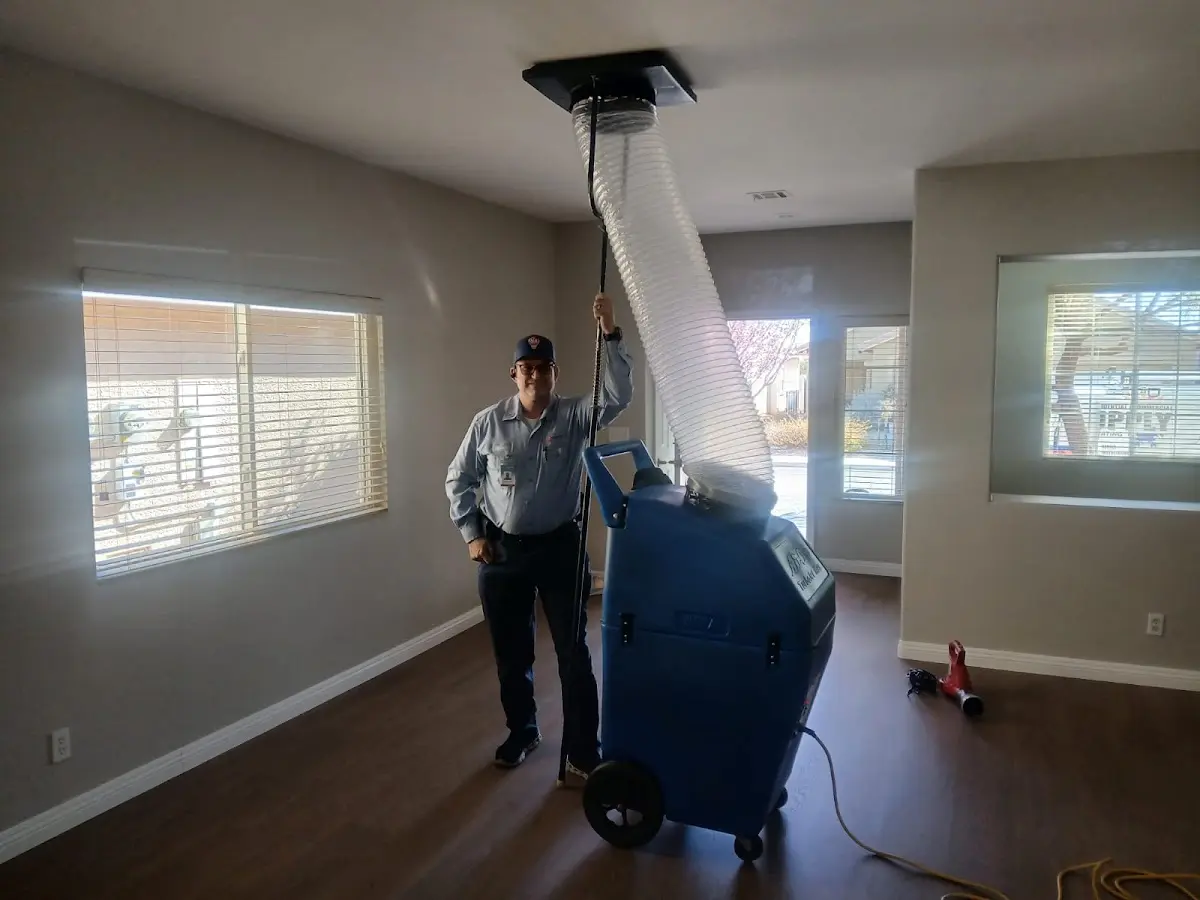 Professional Dryer Vent Cleaning work inside a Tecumseh home